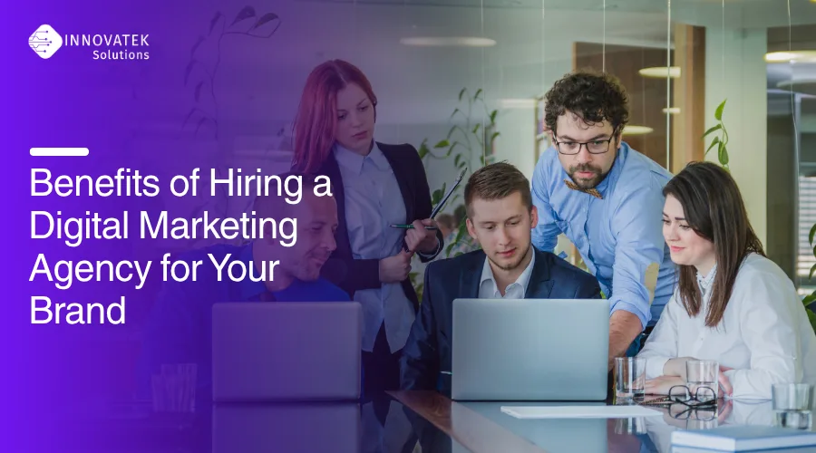 Marketing team collaboration highlighting the benefits of hiring a digital marketing agency
